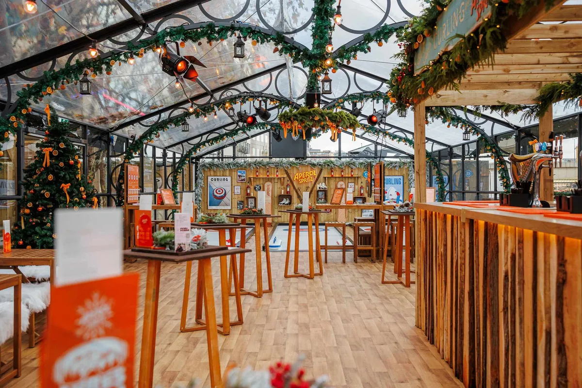 Six custom-built curling lanes at London pop-up venue