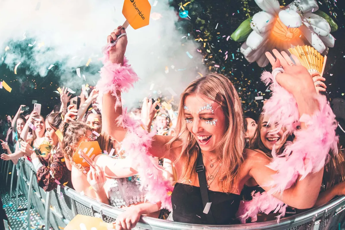 Students enjoying Bumble app promotion with free beer