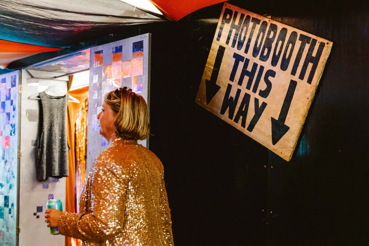 Guests interacting with dressing-up experience at Amazon Fashion Haus