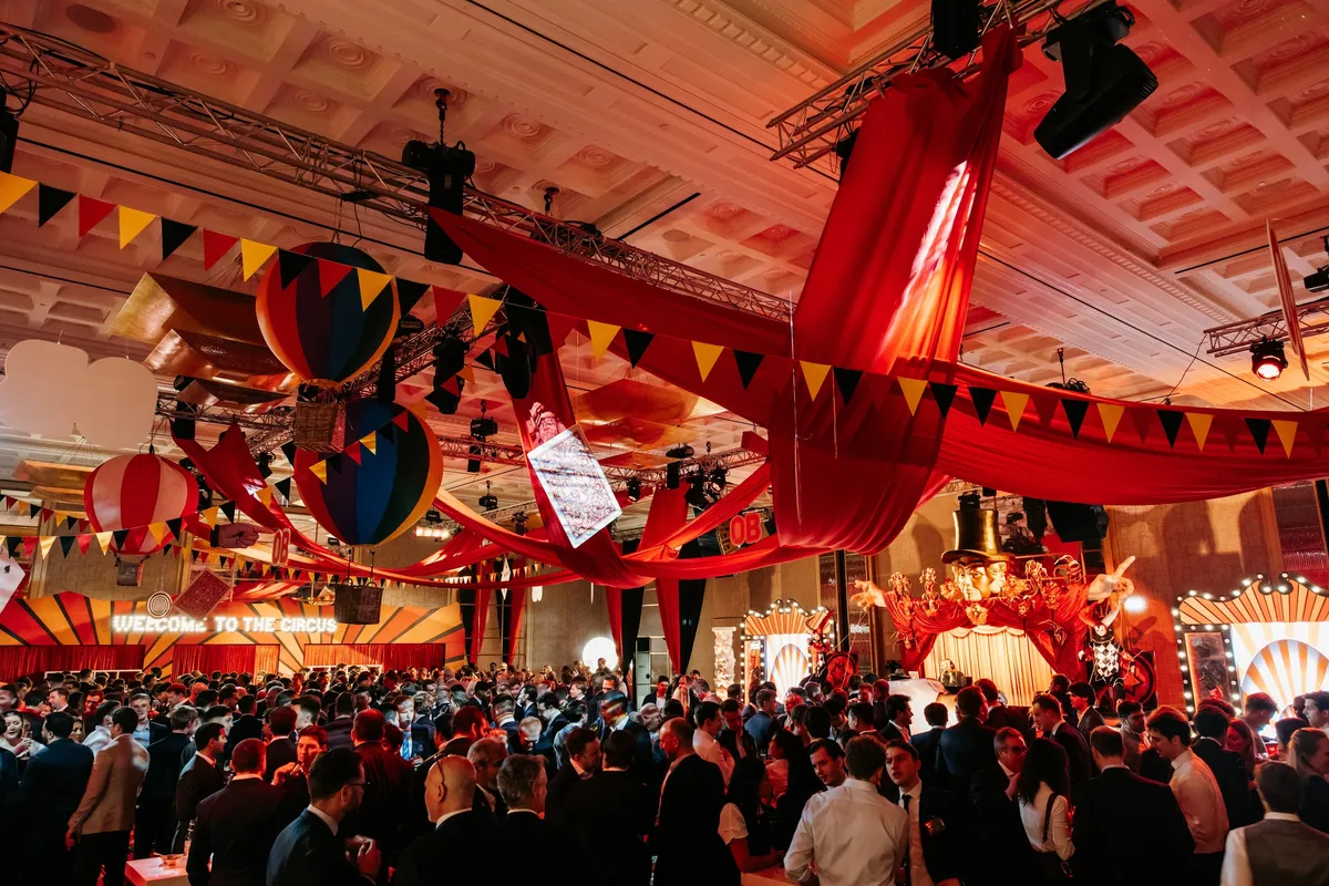 Circus performers entertaining corporate guests