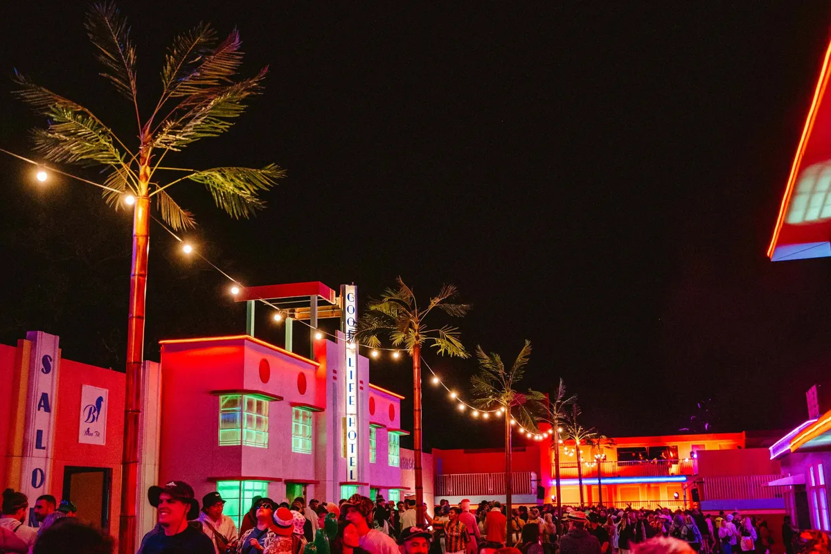 Festival-goers in immersive outdoor venue